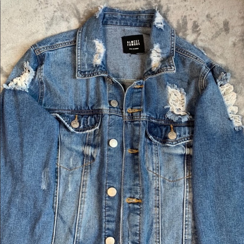 Distressed jean jacket